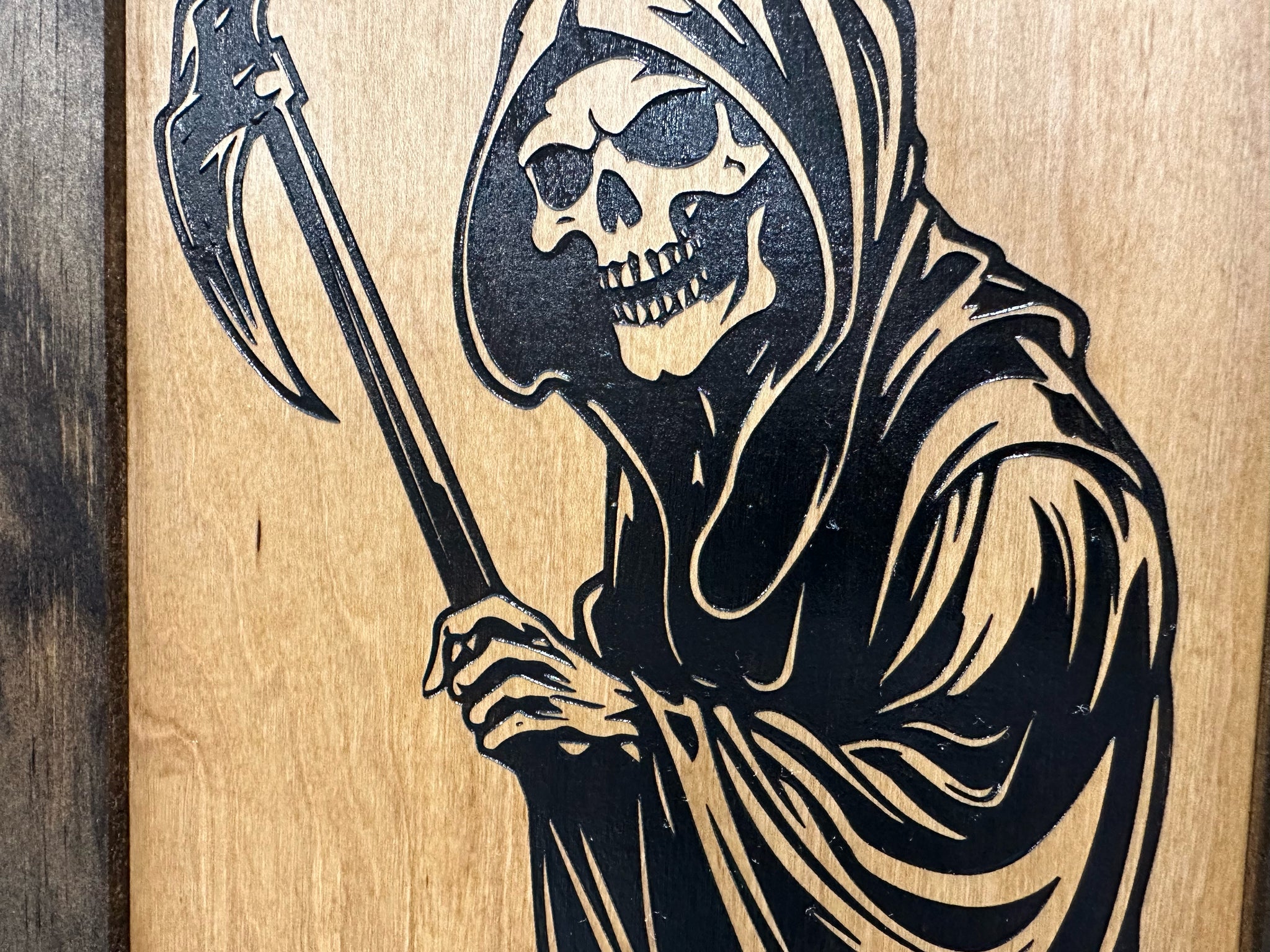 Bellewood Designs grim reaper hidden gun cabinet laser engraved wood art closeup natural wood finish