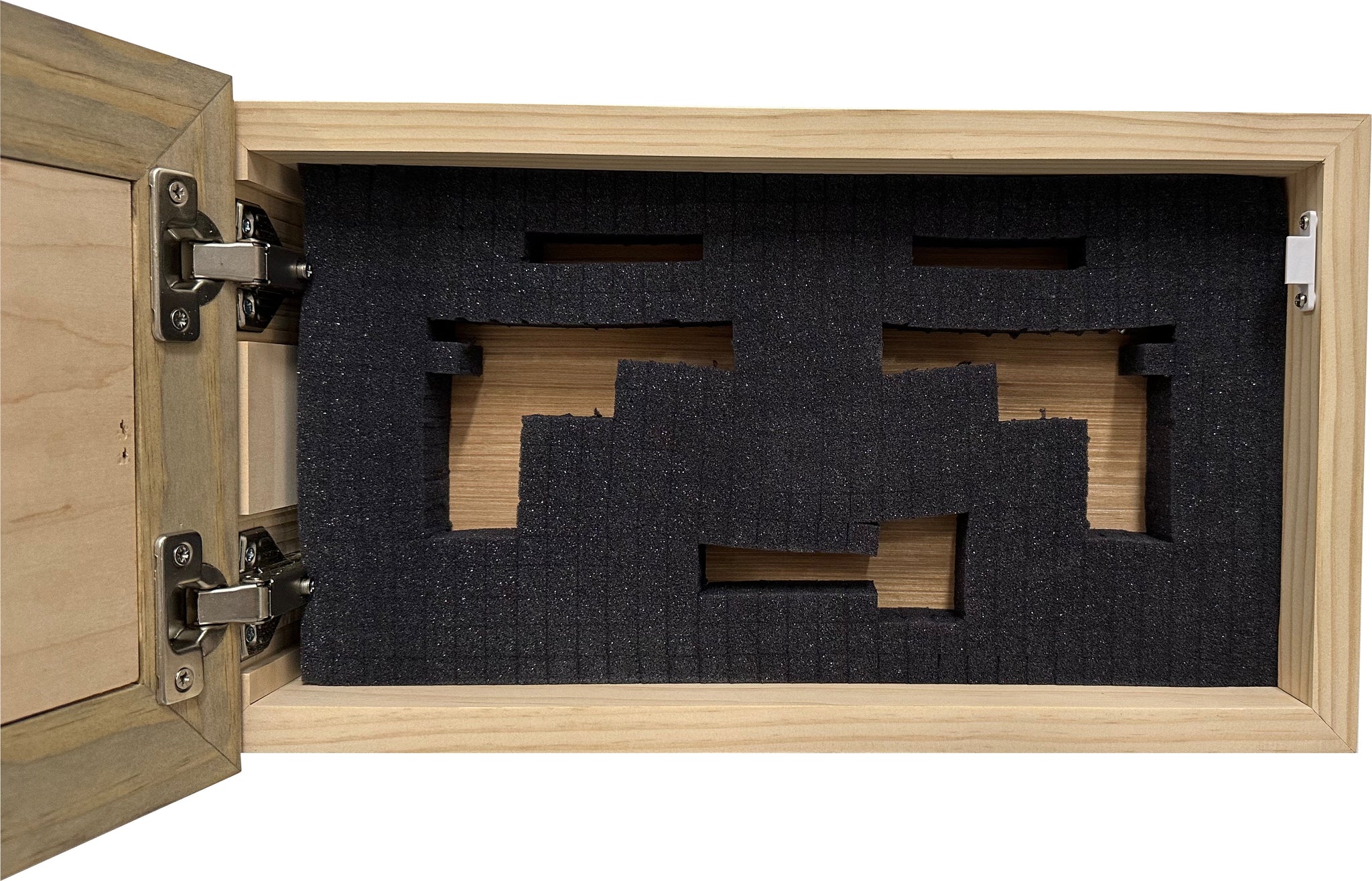 Bellewood Designs hidden gun cabinet interior with pluck foam handgun cutouts and metal hinges in ebony and natural wood