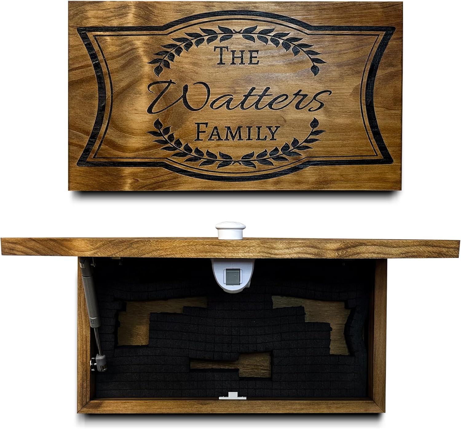 Bellewood Designs personalized hidden gun storage cabinet with engraved family name and wreath design, open showing foam-lined interior