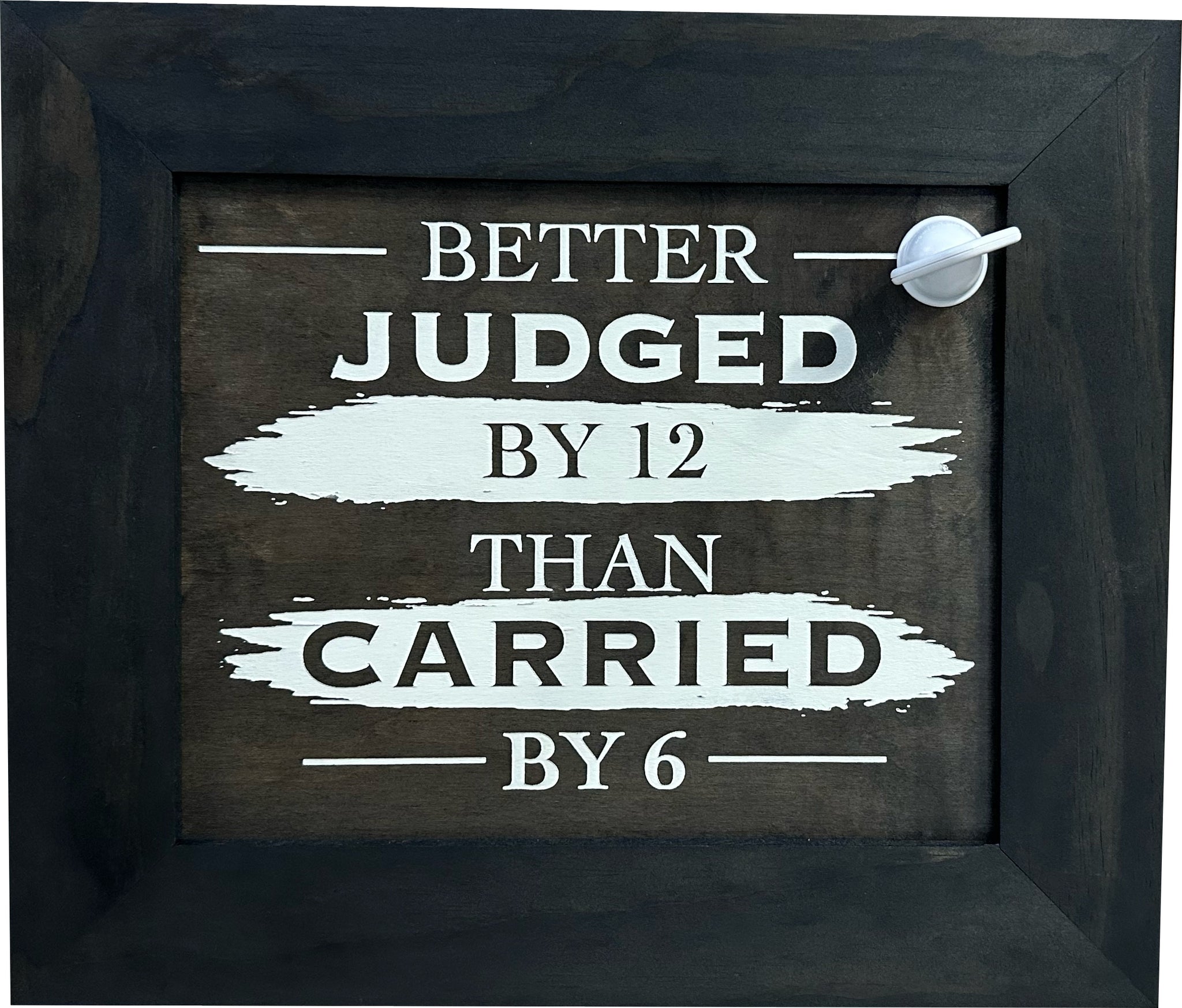 Bellewood Designs Better Judged By 12 Than Carried By 6 concealment wall decor with visible magnetic key