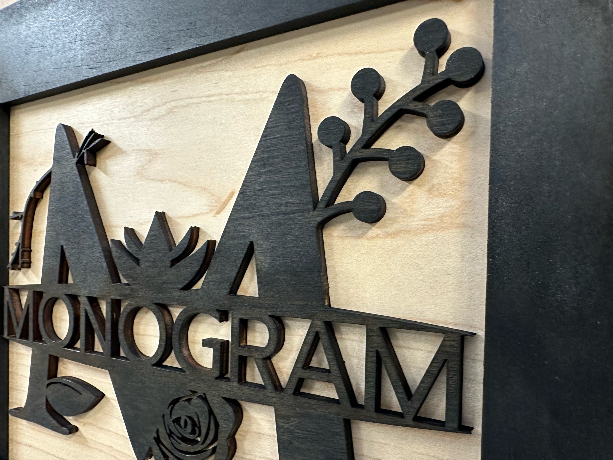 monogram hidden gun storage wall decor close look
